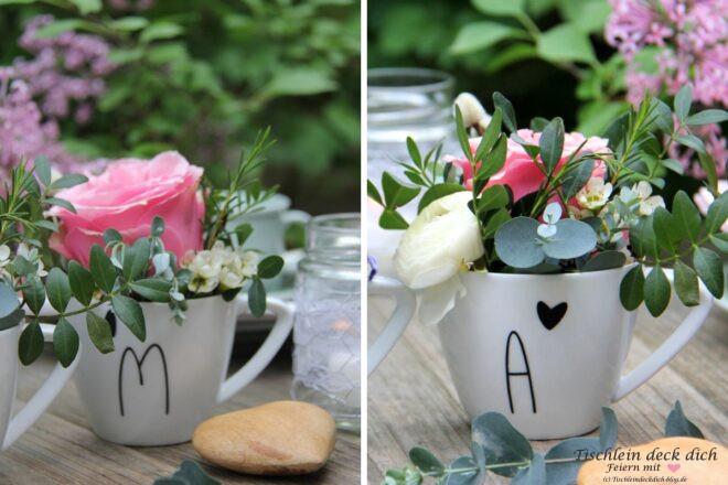 Blumengestecke mit Rosen in der Kaffeetasse zum Muttertag