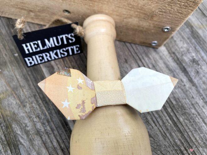 gefalteter Geldschein 50 Euro zur Fliege