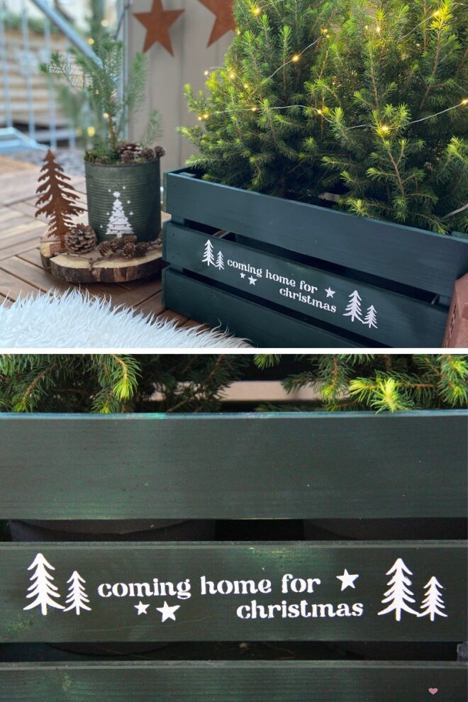 grüne Holzkiste mit Schablonendruck 'coming home for christmas'