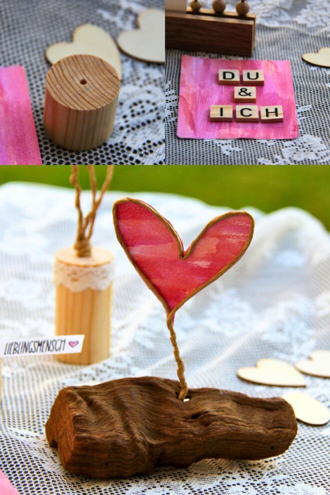 Herz aus Papierdraht in einem Treibholzstück